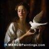A beautiful painting of a girl holding a white dove