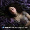 A girl lying on a purple sheet on a floor full of lavender