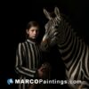 A girl posing next to a zebra