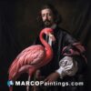 A man in black holding a pink flamingo