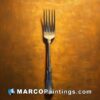 A painting of a silver fork on a yellow background