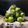 A painting with brussel sprouts piled together on cloth
