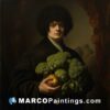 A portrait of a man holding up broccoli and an apple