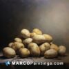 An oil painting of a pile of potatoes