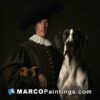 Man dressed in a traditional dutch style and a great dane near a black background