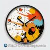 Painted clock with colorful splatters