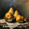 Three gold pears with silver bowl